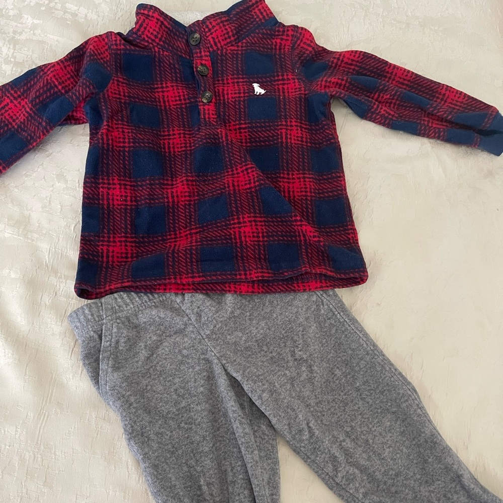 Two-piece Carter’s sweater and sweatpants set.